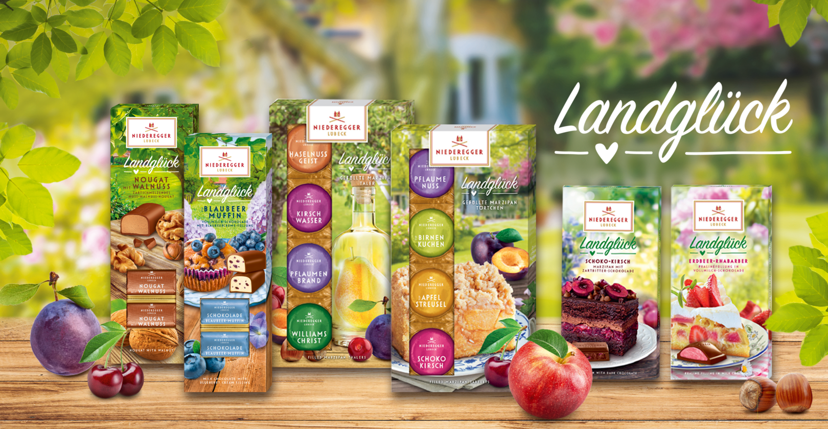 Die Landglück Artikel Schokolade Blaubeer-Muffin, Nougat mit Wallnuss, Marzipan Taler, Marzipan Törtchen, Marzipan Tafel Schoko-Kirsch und Pralinen-Tafel Erdbeer-Rhabarber
